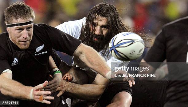 France's lock Sebastien Chabal eyes the ball during their rugby union Test match against New Zealand on June 20, 2009 at Westpack Stadium in...