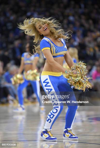 The Golden State Warriors Dance Team performs during an NBA basketball game against the Sacramento Kings at ORACLE Arena on November 27, 2017 in...