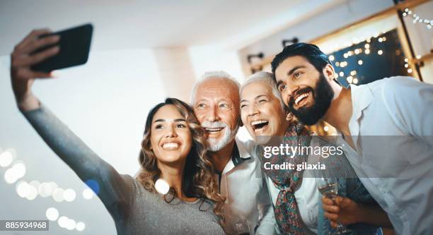 christmas selfie. - multi generation family christmas stock pictures, royalty-free photos & images