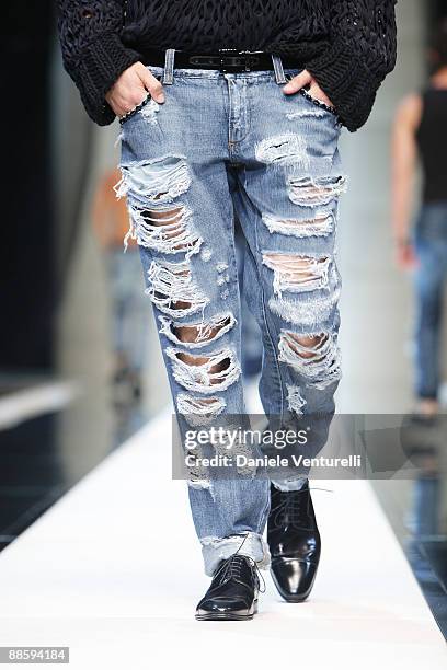 Model walks the runway during the Dolce & Gabbana show as part of Milan Menswear Fashion Week Spring/Summer 2010 on June 20, 2009 in Milan, Italy.