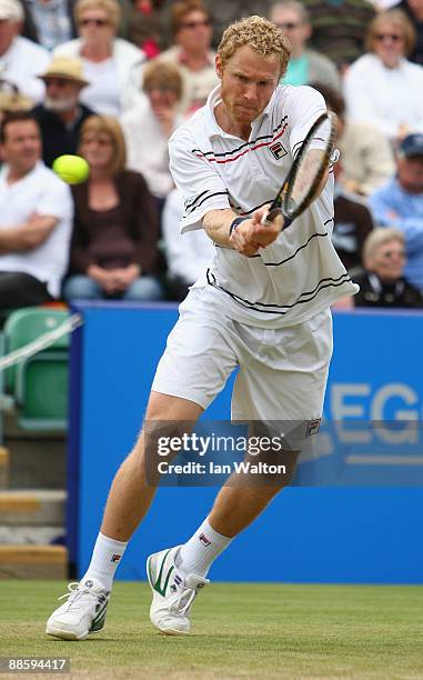 Dmitry Tursunov of Russia in action during the mens Final against Frank Dancevic of Canada during day Six of the AEGON International on June 20, 2009...