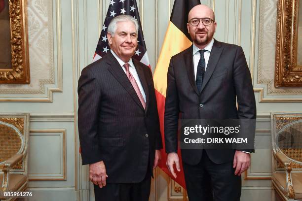 Belgian Prime Minister Charles Michel and US Secretary of State Rex Tillerson pose within their meeting in Brussels on December 5, 2017. US Secretary...