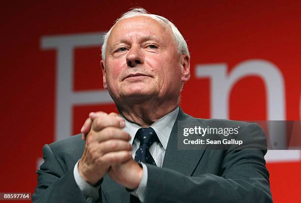 Oskar Lafontaine, Chairman of the German left-wing party Die Linke, gestures after speaking at the party's national convention on June 20, 2009 in...