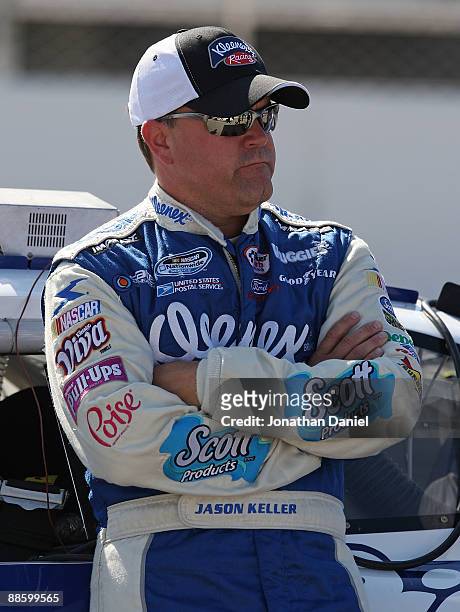 Jason Keller, driver of the Scott Tissue/Pic 'n Save Ford, waits to qualify for the NASCAR Nationwide Series NorthernTool.com 250 on June 20, 2009 at...