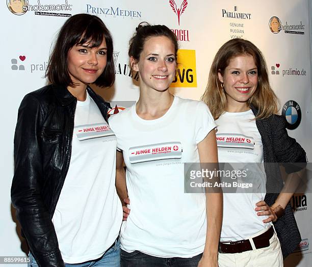 Actresses Susanne Hoecke, Anja Knauer and Cristina Do Rego attend the 'A Audiolarium Full Of Heroes' charity event on June 20, 2009 in Berlin,...