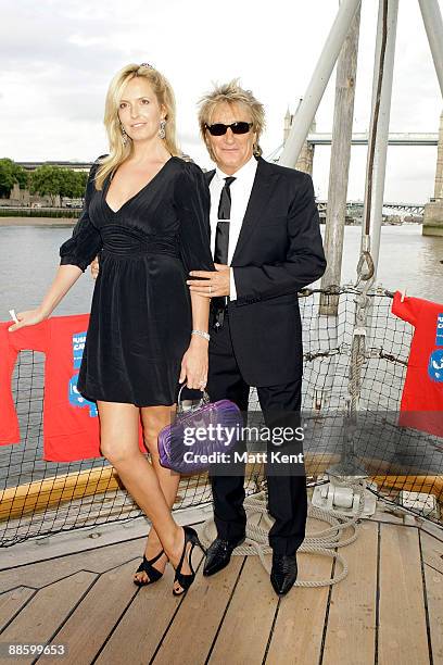 Rod Stewart and Penny Lancaster attend the Busking Cancer launch aboard the HMS Belfast on June 20, 2009 in London, England.