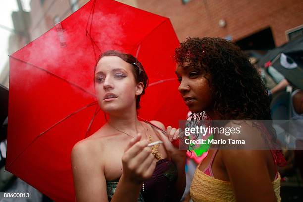 Participants prepare to march before the start of the 2009 Mermaid Parade at Coney Island June 20, 2009 in the Brooklyn borough of New York City....