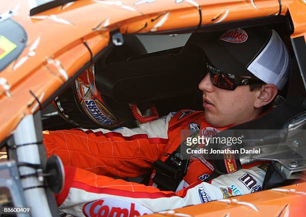 Kyle Busch, driver of the Combos Toyota, prepares for the start of the NASCAR Nationwide Series NorthernTool.com 250 on June 20, 2009 at the...