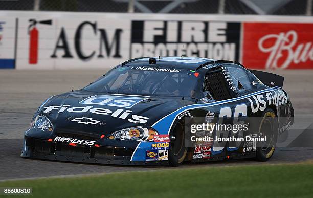 Steve Wallace, driving the USfidelis Chevrolet, races during the NASCAR Nationwide Series NorthernTool.com 250 on June 20, 2009 at the Milwaukee Mile...