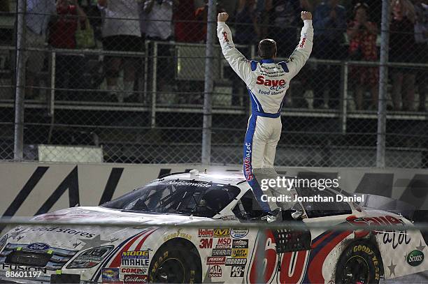 Carl Edwards, driving the Save-a-lot Ford, celebrates a win at the NASCAR Nationwide Series NorthernTool.com 250 on June 20, 2009 at the Milwaukee...