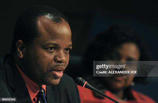 King Mswati III of Swaziland addresses the media at the end of a Southern African Development Community special summit held in Johannesburg on June...