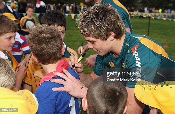James O'Connor signs autographs at the ARU Wallabies fan day at North Sydney Oval on June 21, 2009 in Sydney, Australia.