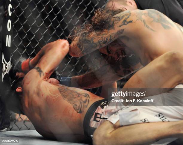 Diego Sanchez battles Clay Guida during their Lightweight bout at The Ultimate Fighter 9: Team US vs. UK Finale at the Pearl at the Palms Hotel and...