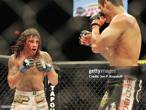 Clay Guida battles Diego Sanchez during their Lightweight bout at The Ultimate Fighter 9: Team US vs. UK Finale at the Pearl at the Palms Hotel and...