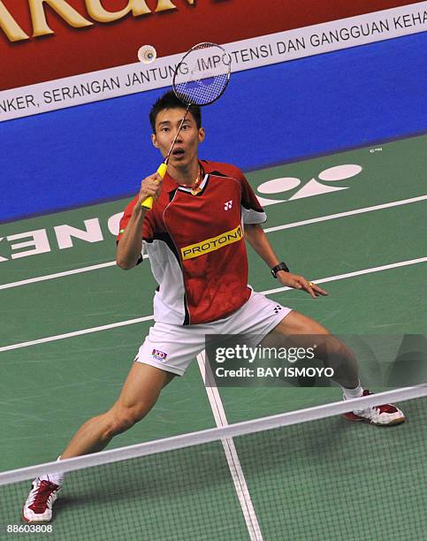 Malaysia's Chong Wei Lee plays against Indonesia's Taufik Hidayat during the men single's final at the Indonesian Open 2009 badminton competition in...