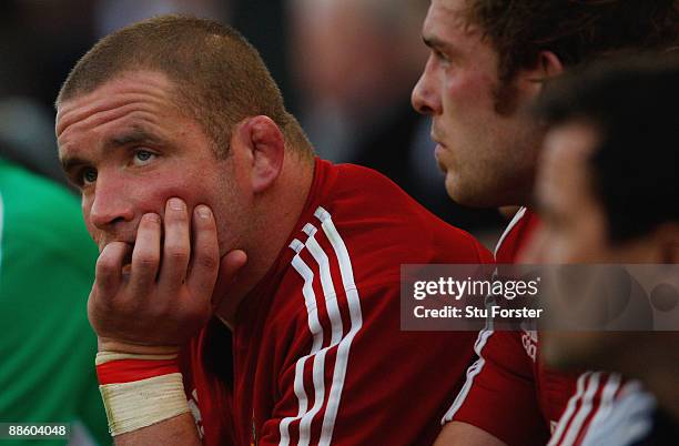 Lions forward Phil Vickery looks dejected as he sits on the bench during the first test match between South African Springboks and the British and...