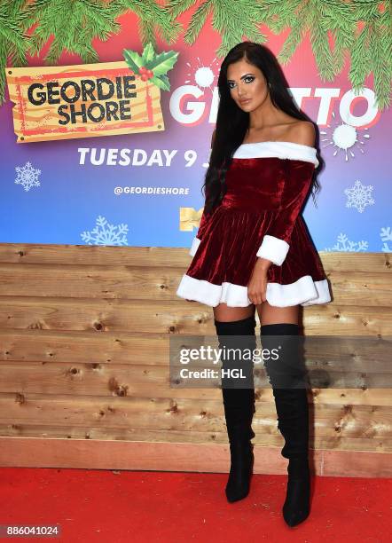 Abbie Holborn attends a Christmas Photocall in Santa's Grotto Leicester Square on December 5, 2017 in London, England.