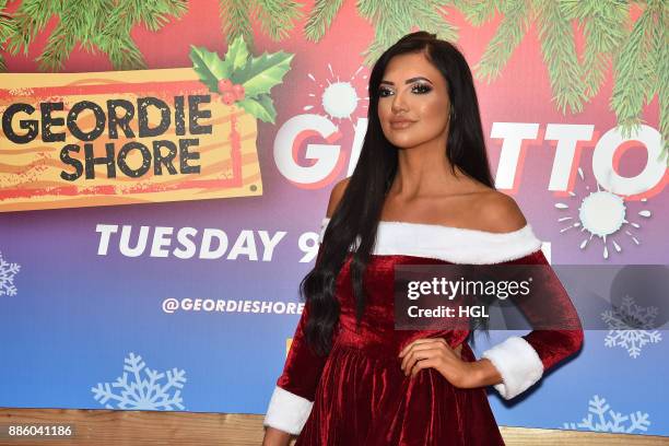 Abbie Holborn attends a Christmas Photocall in Santa's Grotto Leicester Square on December 5, 2017 in London, England.