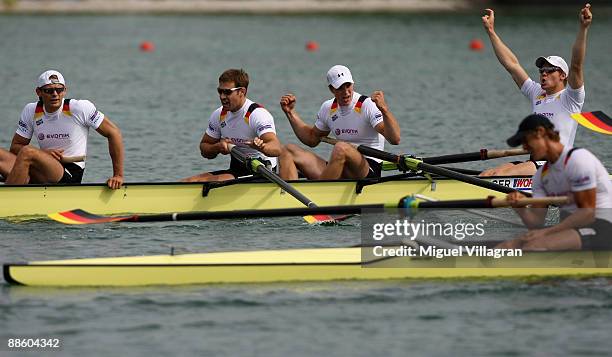 Philip Adamski, Urs Kaeufer, Richard Schmidt and Kristof Wilke of team Germany 2 react after winning the Men's Double Sculls Final of the FISA Rowing...