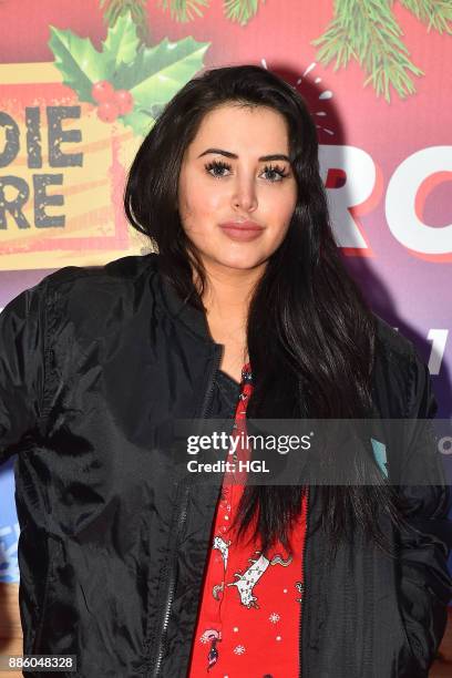 Marnie Simpson attends a Christmas Photocall in Santa's Grotto at Leicester Square on December 5, 2017 in London, England.