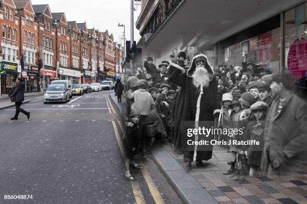 In this digital composite image a comparison has been made of London at Clapham Junction in 1926 and Modern Day 2017 at Christmas time. LONDON,...