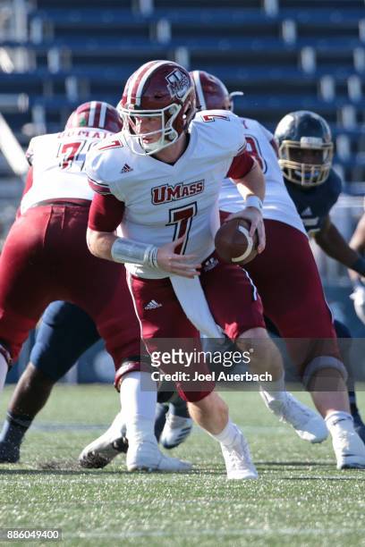 Andrew Ford of the Massachusetts Minutemen runs out of the pocket with the ball against the Florida International Golden Panthers on December 2, 2017...
