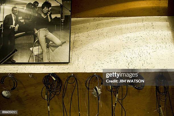 By Rob Lever, Entertainment-US-music-company-Motown A portrait of Diana Ross and Barry Gordy hangs from the wall next to recording gear at Studio A...