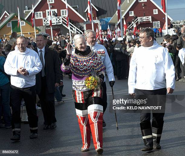 Denmark's Queen Margrethe and her husband, Prince Henrik, attend the ceremonies to celebrate the new era of self rule of Greenland in Nuuk on June...