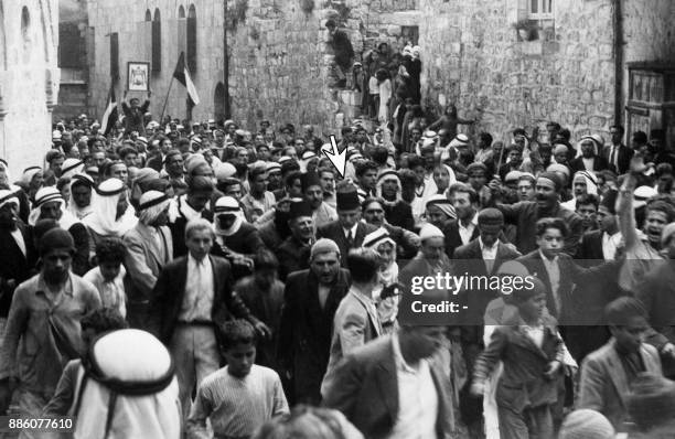 Picture dated before 1937 during the British Mandate in Palestine shows Arabs demonstrating in the Old City of Jerusalem against the Jewish...