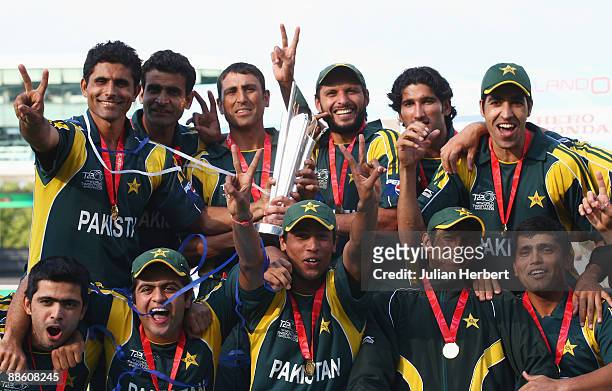 Younis Khan of Pakistan lifts the trophy with Shahid Afridi and team mates during the ICC World Twenty20 Final between Pakistan and Sri Lanka at...