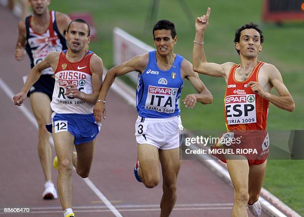 Spanish Jesus Espana celebrates next to Italian Daniele Meucci and Russian Sergey Ivanov after wining the men's 3000m event at the European Team...