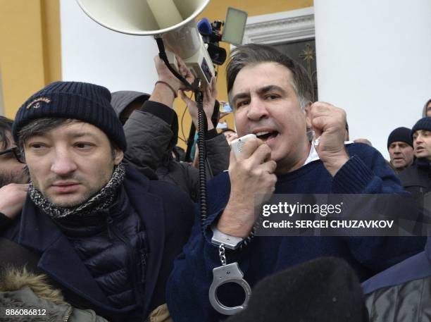 Former Georgian Pdresident Mikheil Saakashvili speaks after he was released by his supporters in downtown Kiev on December 5, 2017. Ukrainian...