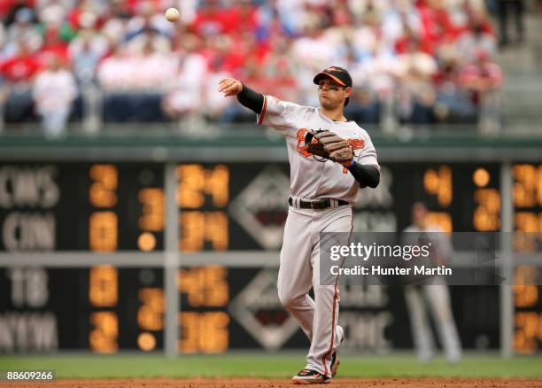 Second baseman Brian Roberts of the Baltimore Orioles throws to first base during a game against the Philadelphia Phillies at Citizens Bank Park on...
