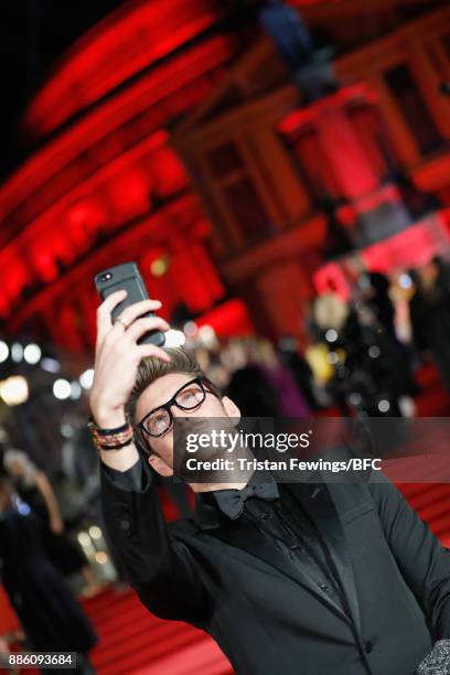 Henry Holland poses for a selfie at The Fashion Awards 2017 in partnership with Swarovski at Royal Albert Hall on December 4, 2017 in London, England.