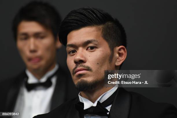 Best Eleven player Hotaru Yamaguchi of Cerezo Osaka poses for photographs during a press conference after the 2017 J.League Awards at Yokohama Arena...
