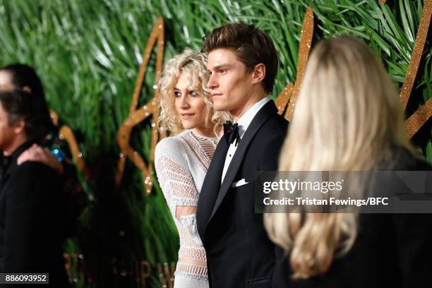 Pixie Lott and Oliver Cheshire attend The Fashion Awards 2017 in partnership with Swarovski at Royal Albert Hall on December 4, 2017 in London,...