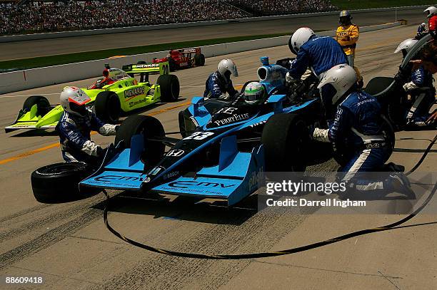 Tomas Scheckter makes a pit stop in the Mona Vie Dreyer and Reinbold Racing Dallara Honda during the IRL Indycar Series Iowa Corn Indy 250 on June...