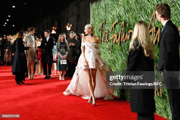 Poppy Delevingne attends The Fashion Awards 2017 in partnership with Swarovski at Royal Albert Hall on December 4, 2017 in London, England.