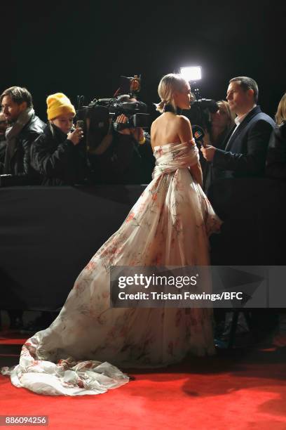 Poppy Delevingne attends The Fashion Awards 2017 in partnership with Swarovski at Royal Albert Hall on December 4, 2017 in London, England.