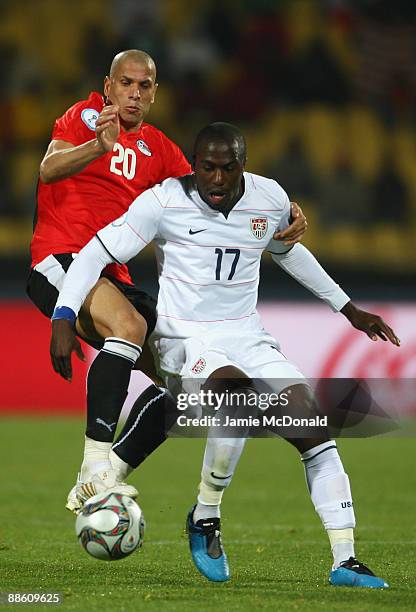 Jozy Altidore of USA battles with Mohamed Aboutrika of Egypt during the FIFA Confederations Cup match between Egypt and USA at Royal Bafokeng Stadium...