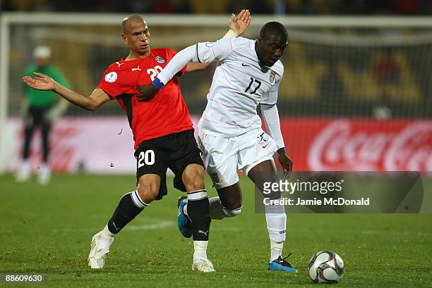 Jozy Altidore of USA battles with Mohamed Aboutrika of Egypt during the FIFA Confederations Cup match between Egypt and USA at Royal Bafokeng Stadium...