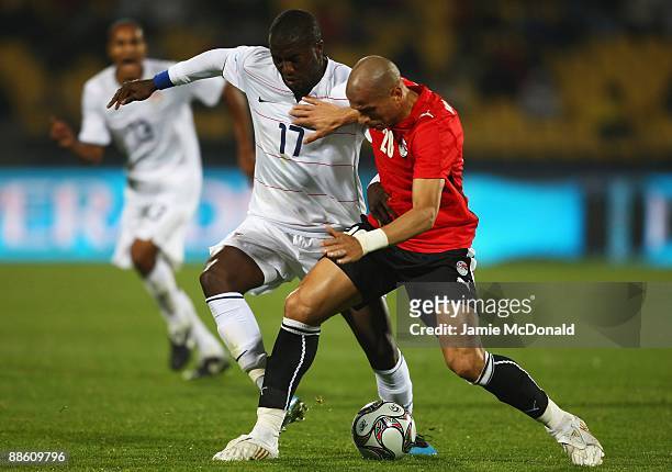 Jozy Altidore of USA battles with Mohamed Aboutrika of Egypt during the FIFA Confederations Cup match between Egypt and USA at Royal Bafokeng Stadium...