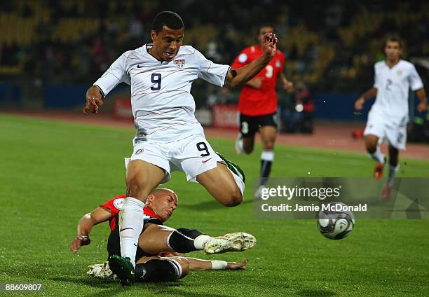 Charlie Davies of USA battles with Mohamed Aboutrika of Egypt during the FIFA Confederations Cup match between Egypt and USA at Royal Bafokeng...