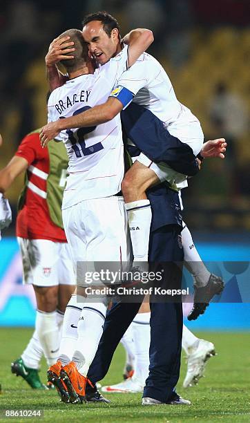 Michael Bradley and Landon Donovan of the USA celebrate after the FIFA Confederations Cup match between Egypt and USA at Royal Bafokeng Stadium on...