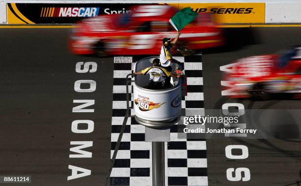 Kasey Kahne, driver of the Budweiser Dodge, restarts after a caution during the NASCAR Sprint Cup Series Toyota/Save Mart 350 at the Infineon Raceway...