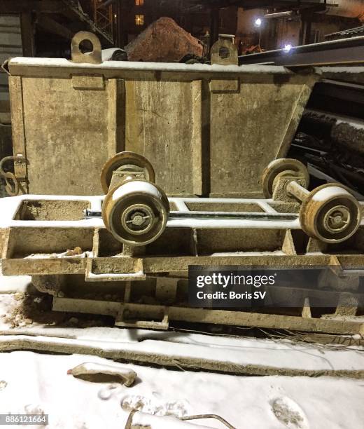 old mine cart covered with snow - mining cart stock pictures, royalty-free photos & images