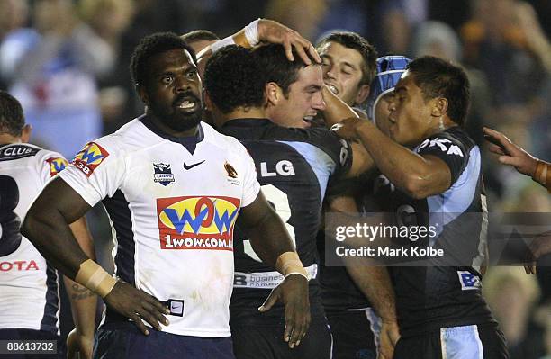 Palmer Wapau of the Broncos shows his frustration after Grant Millington of the Sharks scored a try during the round 15 NRL match between the...