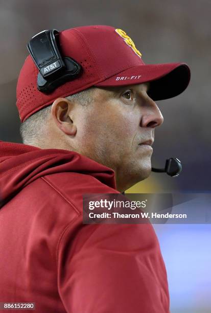 Head coach Clay Helton of the USC Trojans looks on from the sidelines against the Stanford Cardinal during the Pac-12 Football Championship Game at...