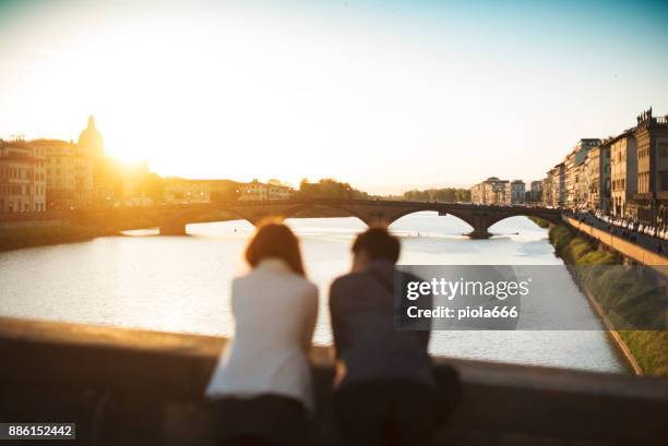 couple of tourists in florence, travelling around italy - florence italy city stock pictures, royalty-free photos & images