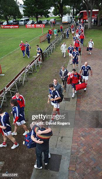 Tim Payne the Lions replacement prop is greeted by Wasps team mate Phil Vickery during the British and Irish Lions training session held at Bishops...